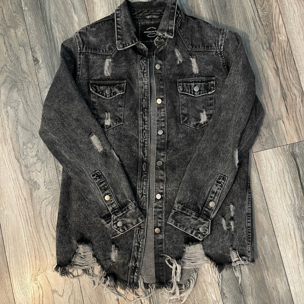 Longer-length distressed denim shacket